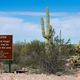 A sign warns against illegal smuggling in Organ Pipe Cactus National Monument near Lukeville, Arizona.